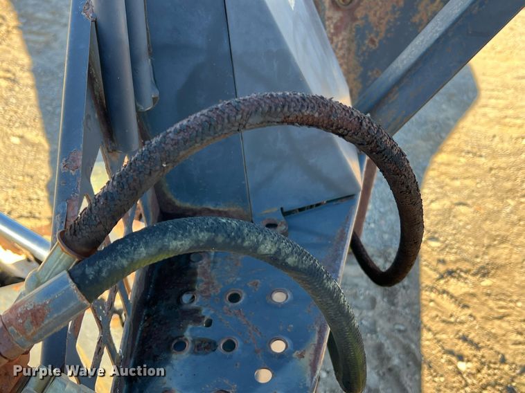 image for item NM9014 Melroe 811  skid steer backhoe