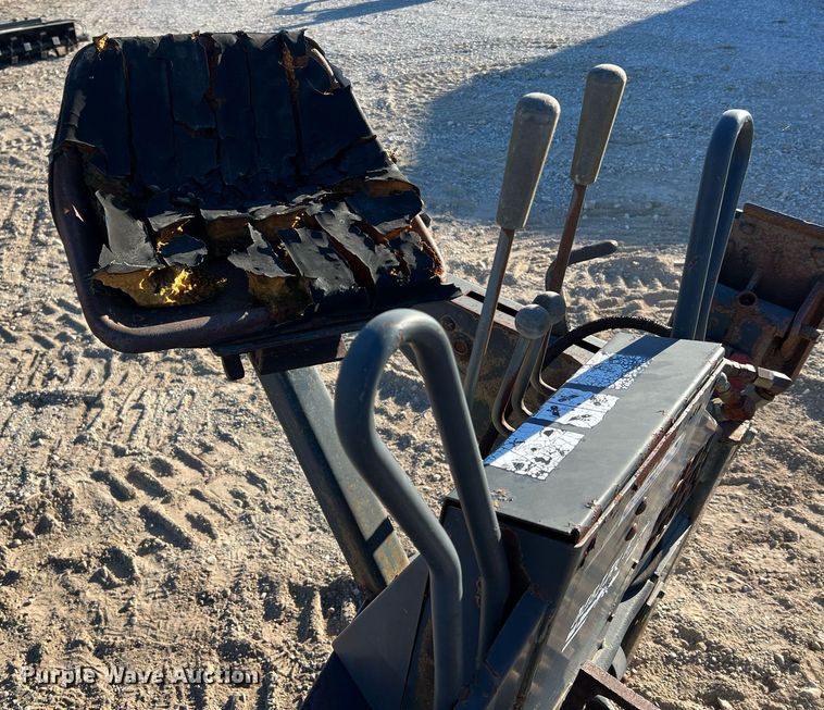 image for item NM9014 Melroe 811  skid steer backhoe