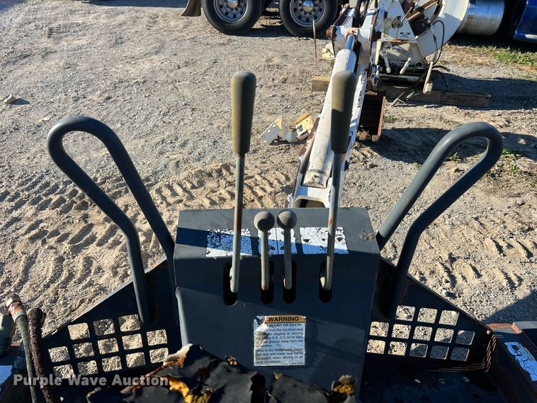 image for item NM9014 Melroe 811  skid steer backhoe