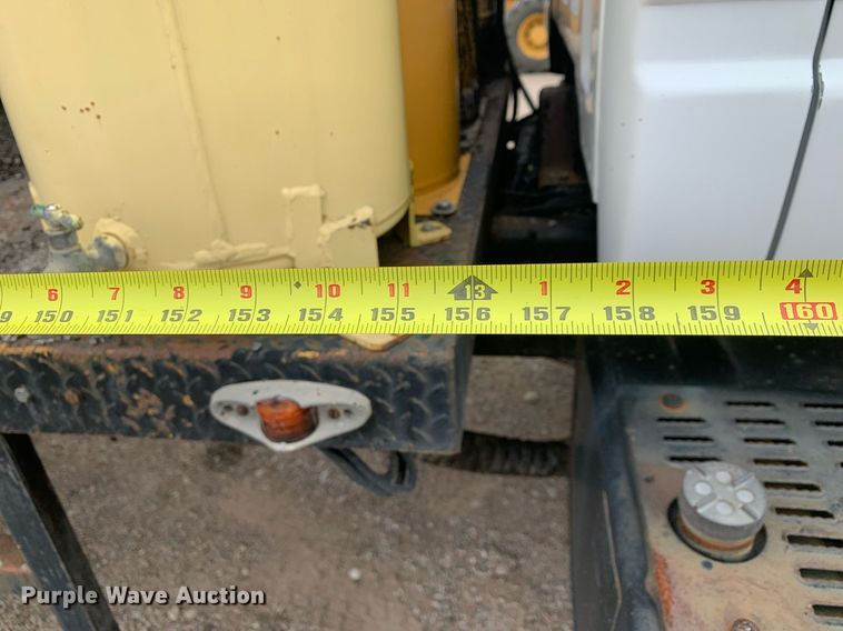 image for item DP8753 2002 GMC C7500  pothole patcher truck