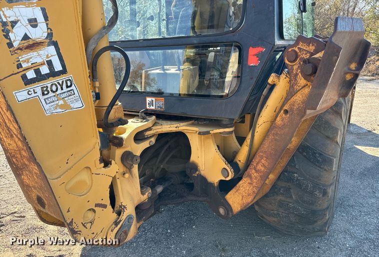 image for item GG9850 1985 John Deere 310SE  backhoe