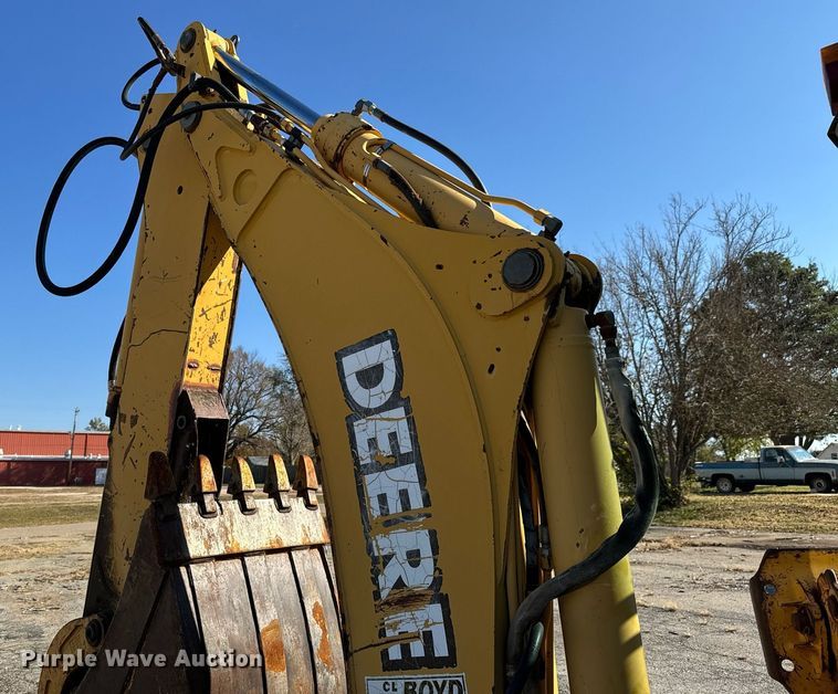 image for item GG9850 1985 John Deere 310SE  backhoe