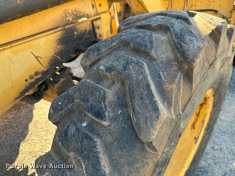 image for item GG9850 1985 John Deere 310SE  backhoe