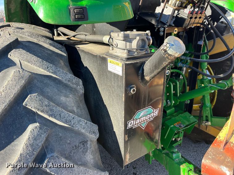 image for item LD9883 2015 John Deere 6125M  MFWD tractor