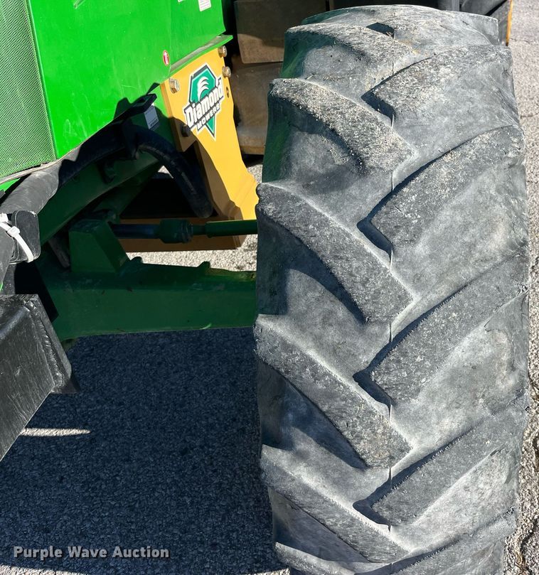 image for item LD9883 2015 John Deere 6125M  MFWD tractor