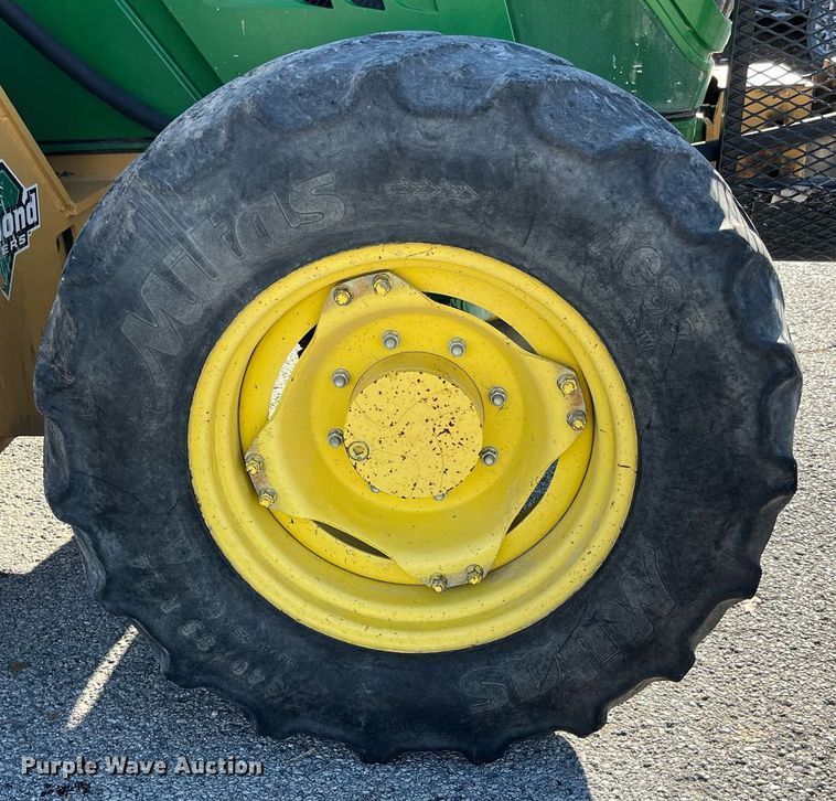 image for item LD9883 2015 John Deere 6125M  MFWD tractor