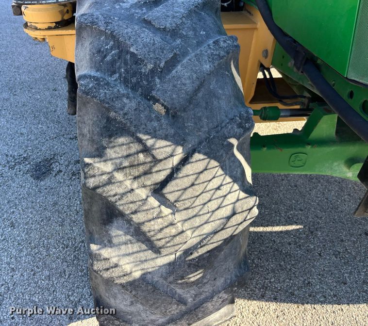 image for item LD9883 2015 John Deere 6125M  MFWD tractor