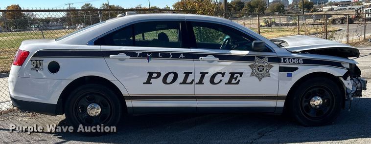 image for item OM9052 (2) Ford Taurus Police Interceptors