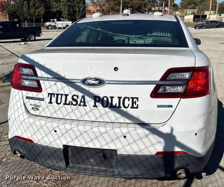 image for item OM9052 (2) Ford Taurus Police Interceptors