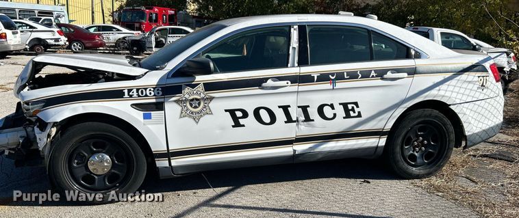 image for item OM9052 (2) Ford Taurus Police Interceptors