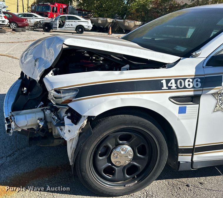 image for item OM9052 (2) Ford Taurus Police Interceptors