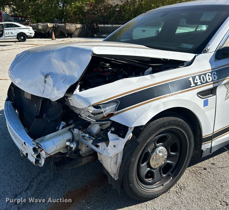 image for item OM9052 (2) Ford Taurus Police Interceptors