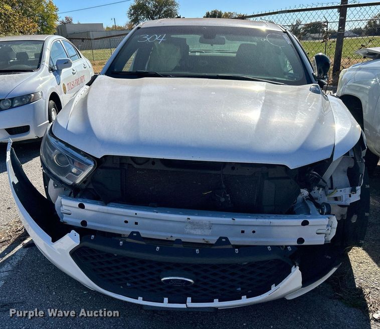 image for item OM9052 (2) Ford Taurus Police Interceptors