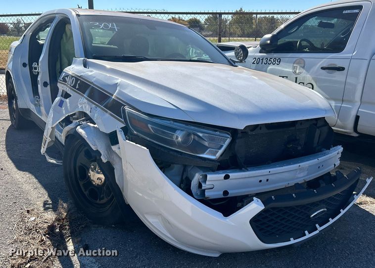 image for item OM9052 (2) Ford Taurus Police Interceptors