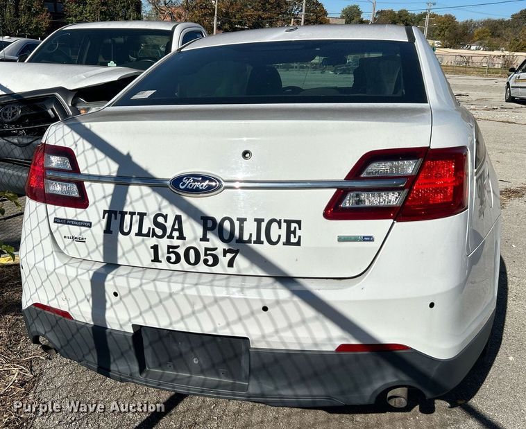 image for item OM9052 (2) Ford Taurus Police Interceptors