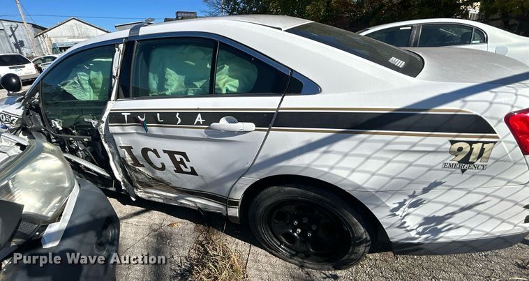 image for item OM9052 (2) Ford Taurus Police Interceptors