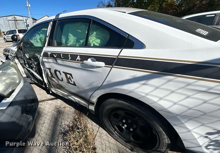 image for item OM9052 (2) Ford Taurus Police Interceptors