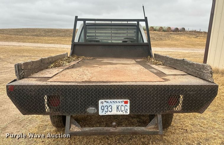 image for item DM2632 1990 GMC Sierra 2500HD flatbed pickup truck