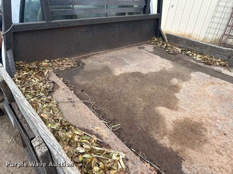 image for item DM2632 1990 GMC Sierra 2500HD flatbed pickup truck