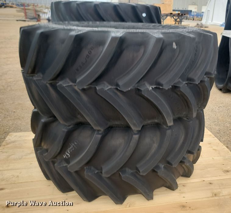 image for item JW9516 (2) Goodyear Optic Trac DT824 600/65R28 tires and wheels