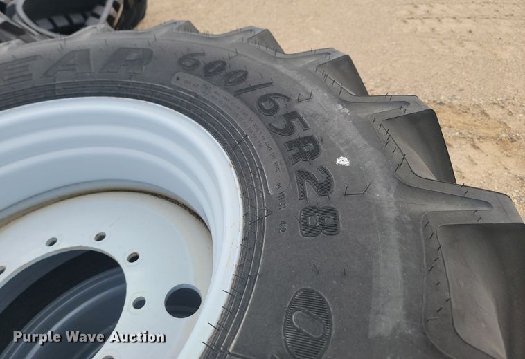 image for item JW9516 (2) Goodyear Optic Trac DT824 600/65R28 tires and wheels