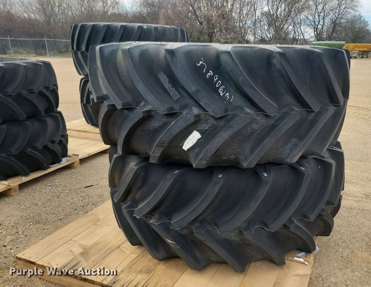 image for item JW9517 (2) Goodyear Optictrac DT824 710/70R38 tires and wheels