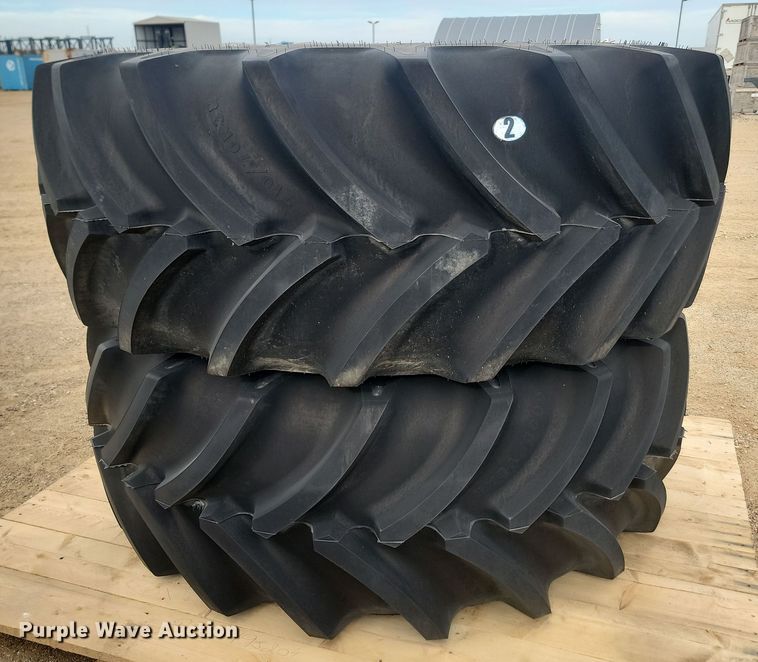 image for item JW9517 (2) Goodyear Optictrac DT824 710/70R38 tires and wheels