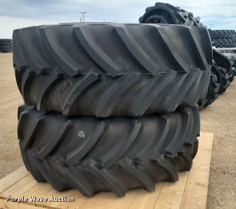 image for item JW9517 (2) Goodyear Optictrac DT824 710/70R38 tires and wheels