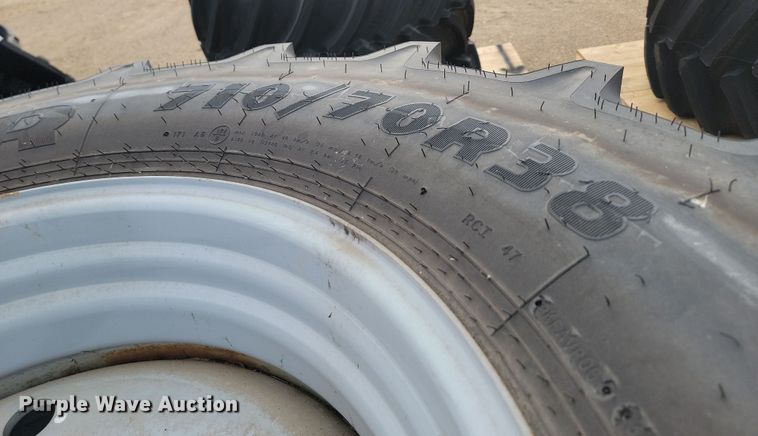 image for item JW9517 (2) Goodyear Optictrac DT824 710/70R38 tires and wheels