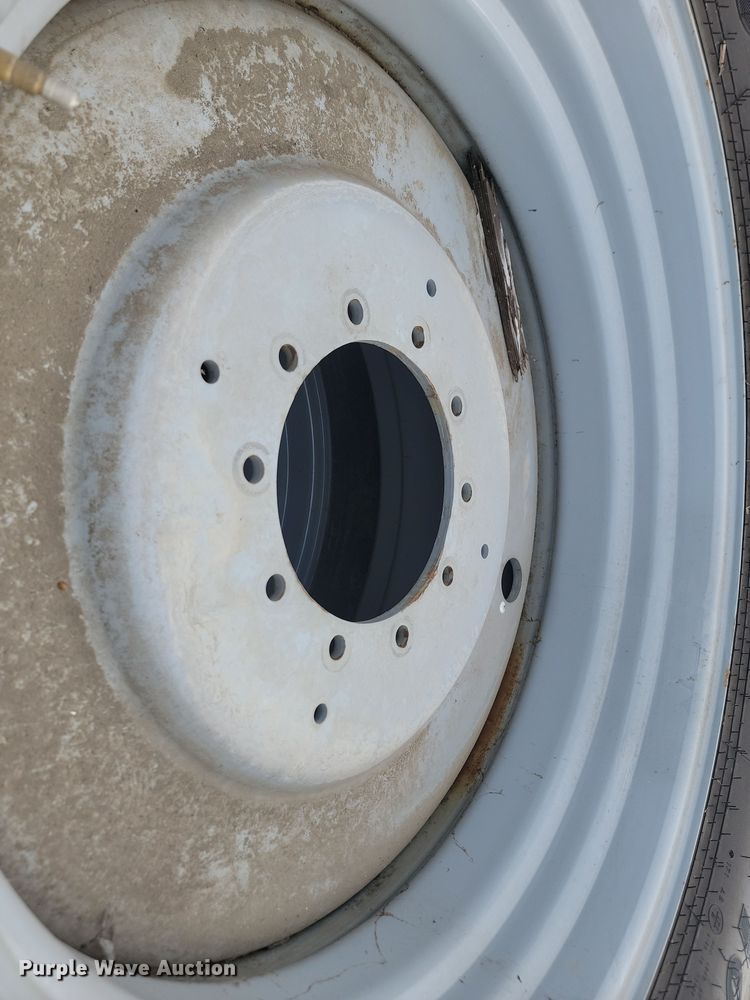 image for item JW9517 (2) Goodyear Optictrac DT824 710/70R38 tires and wheels