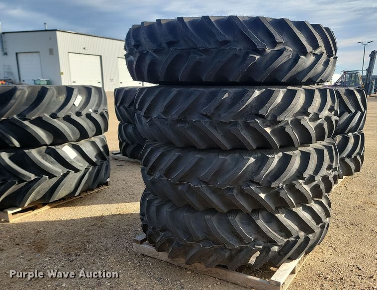 image for item JW9562 (4) Titan Hi-Traction Lug Radial 480/80R42 tires and wheels