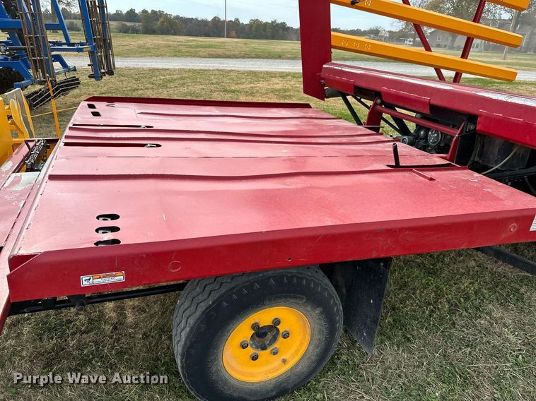 image for item KT9170 New Holland 1068  bale wagon