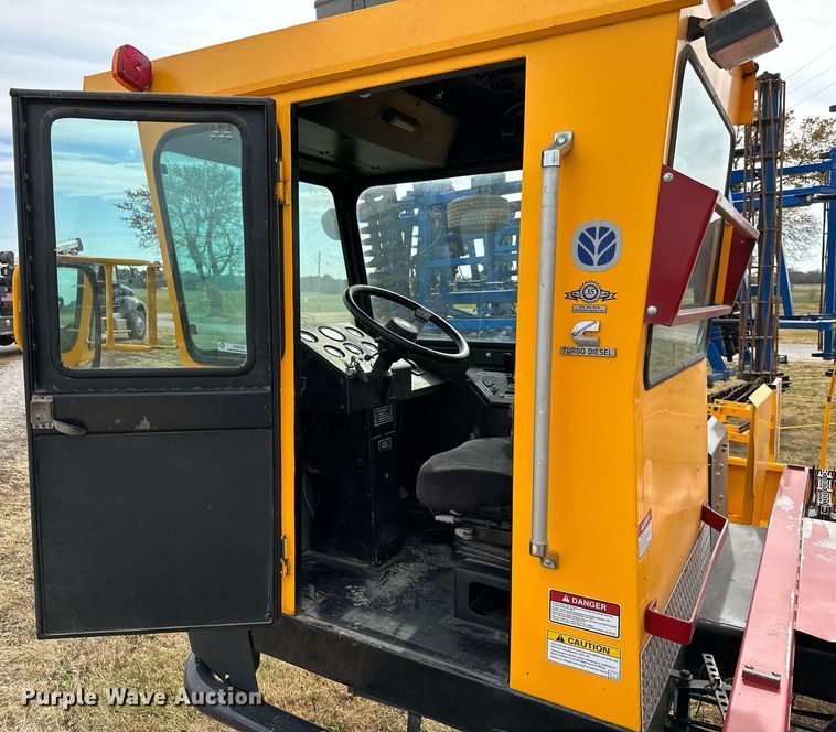 image for item KT9170 New Holland 1068  bale wagon