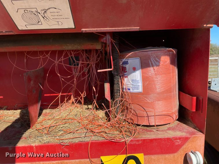 image for item LV9148 New Holland 654  round baler