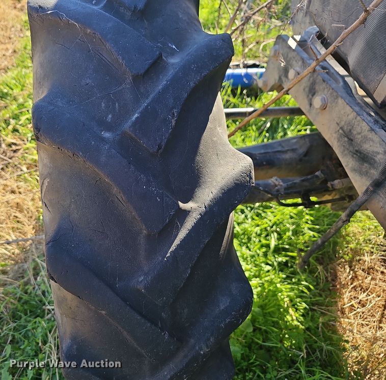 image for item NP9130 2012 New Holland Workmaster 75  MFWD tractor