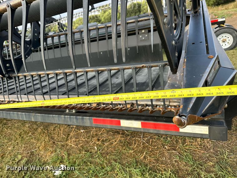 image for item NP9586 2004 MacDon 974  flex draper head