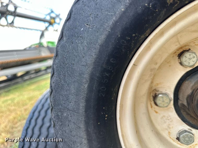 image for item NP9586 2004 MacDon 974  flex draper head