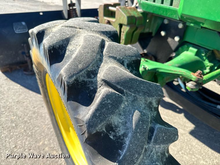 image for item GG9957 1997 John Deere 1070  MFWD tractor