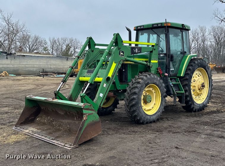 image for item LO9401 2002 John Deere 7410  MFWD tractor