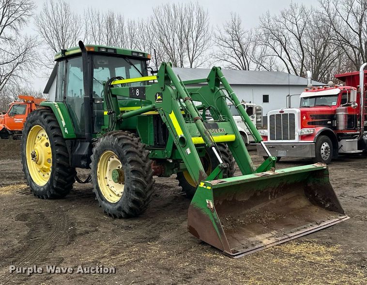 image for item LO9401 2002 John Deere 7410  MFWD tractor