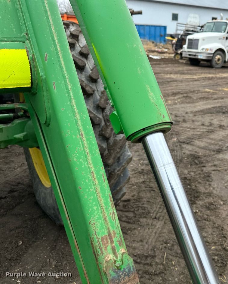 image for item LO9401 2002 John Deere 7410  MFWD tractor