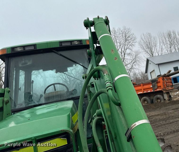 image for item LO9401 2002 John Deere 7410  MFWD tractor