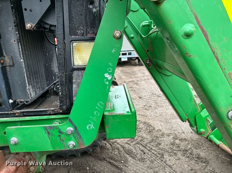 image for item LO9401 2002 John Deere 7410  MFWD tractor