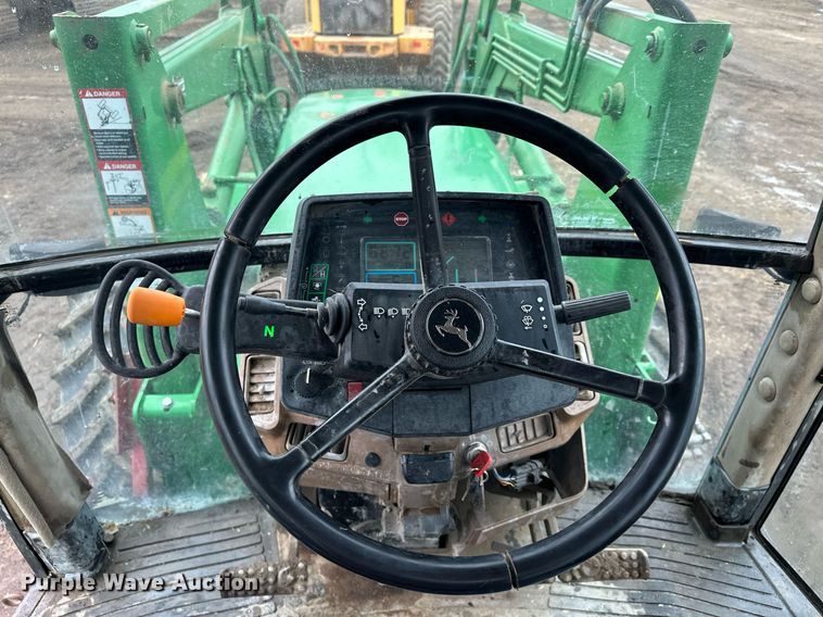 image for item LO9401 2002 John Deere 7410  MFWD tractor