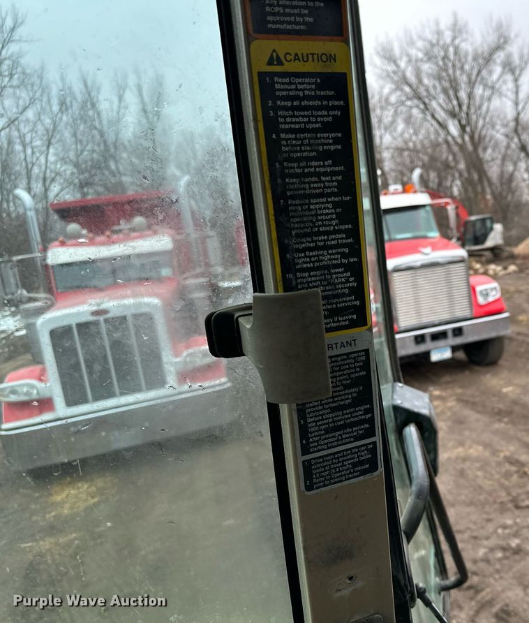 image for item LO9401 2002 John Deere 7410  MFWD tractor