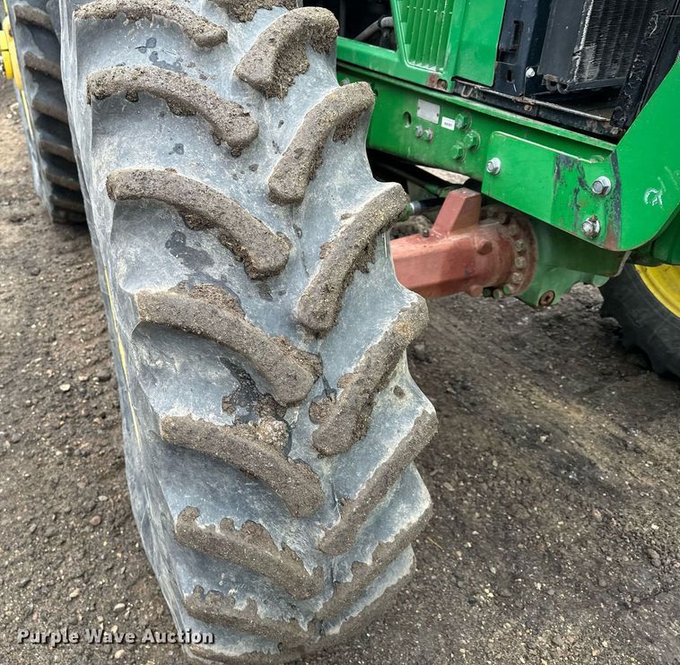 image for item LO9401 2002 John Deere 7410  MFWD tractor