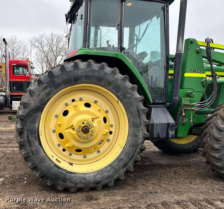 image for item LO9401 2002 John Deere 7410  MFWD tractor