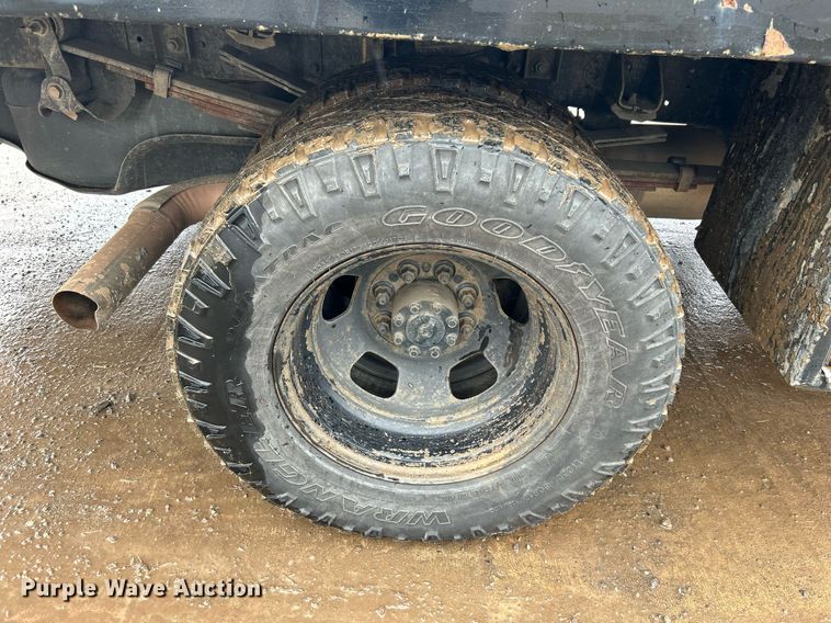 image for item DN0499 2014 Dodge Ram 3500HD  Crew Cab flatbed pickup truck