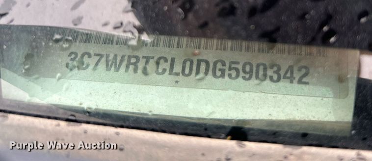 image for item DN0499 2014 Dodge Ram 3500HD  Crew Cab flatbed pickup truck