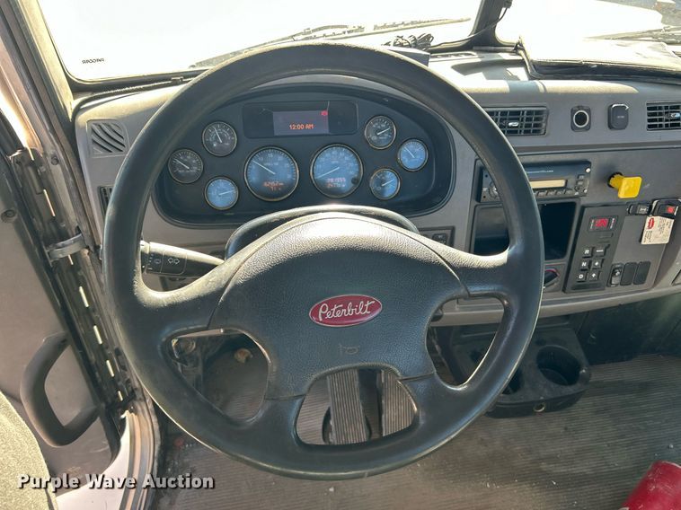 image for item DN0607 2014 Peterbilt 330  dump flatbed truck